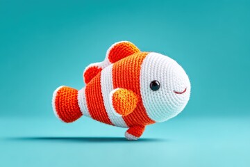 Cute Orange White Striped Crochet Fish Plush Toy on Bright Blue Background