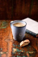 Cup of coffee on rustic wooden background. Soft focus. Copy space	