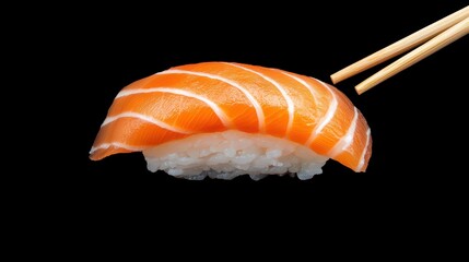 Fresh Salmon Sushi on Rice with Chopsticks Isolated on Black Background for Culinary and Japanese Cuisine Themes