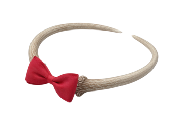 A red bow tie on a deer antler headband isolated on transparent background