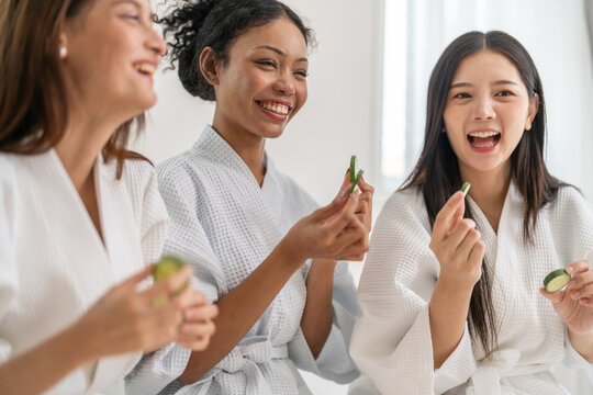 Diverse group of beauty women enjoy skincare routine, applying cucumber eye masks for hydration and wrinkle free skin, beauty self care spa, cosmetic, glowing and refreshing facial treatment at home