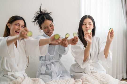 Diverse group of beauty women enjoy skincare routine, applying cucumber eye masks for hydration and wrinkle free skin, beauty self care spa, cosmetic, glowing and refreshing facial treatment at home