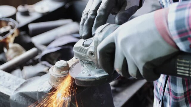 Zoom Back View Construction Industrial Factory or Metalwork Concept by Mechanic or Technician Using Grinder with Auto Part Workshop