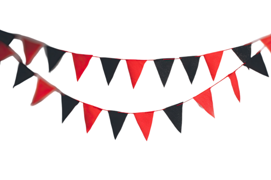 Two rows of red and black triangular pennants, forming a cheerful smile shape, hanging against a black background