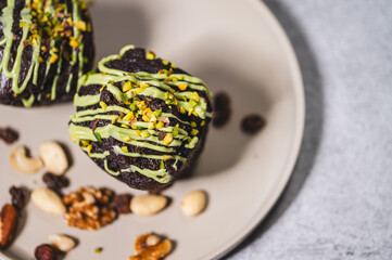A delicious muffin with aromatic Arabic chocolate, served on an elegant plate. A delicate cake with a fluffy texture. Stylish dessert photography.