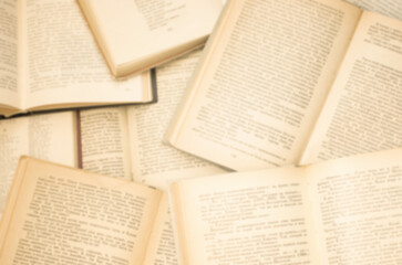 Obraz premium Top view of open books blurred background.