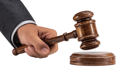 Judge's hand holds wooden gavel, ready to strike