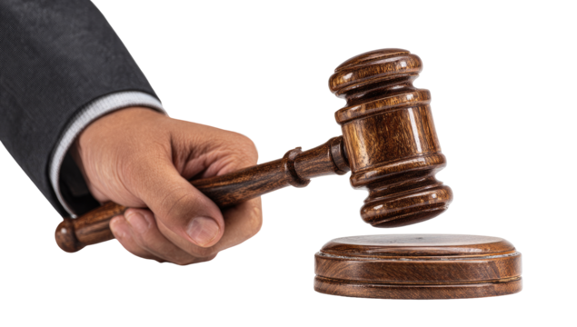 Judge's hand holds wooden gavel, ready to strike