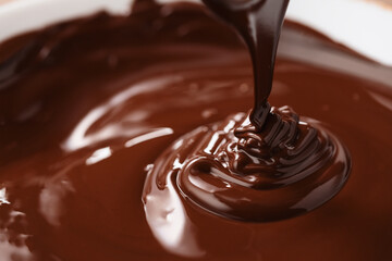 poured melted dark chcolate background closeup