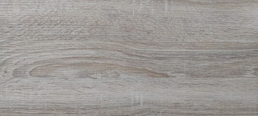 Wood texture in shades of light grey and brown, featuring natural grain patterns and subtle lines throughout the surface, creating an organic design. No visible text or marks present
