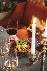 An Elegant Table Setting Featuring Salad and Wine, Perfect for