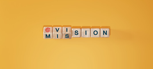 Obraz premium Fliped wooden cubes vision to a mission. Dice form the words vision and mission.