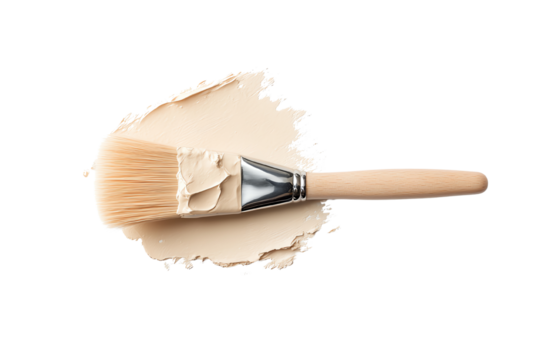 A paintbrush with creamy paint on a white background, perfect for creative projects and artistic endeavors.