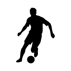 Silhouette of a soccer player dribbling a ball
