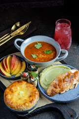Indulge in a Delicious Comfort Food Platter that includes Soup