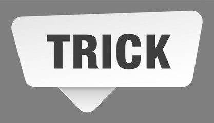 trick sign. trick white sticker isolated on gray background