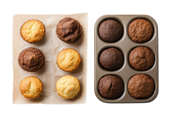Assorted chocolate and vanilla muffins displayed on a baking tray and parchment paper against a white background.