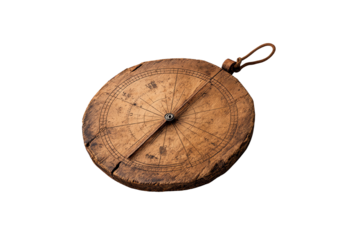 Antique navigation tool, a wooden astrolabe with intricate designs, on a white isolated background.