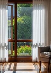 Bright interior view featuring an open window with lush greenery outside