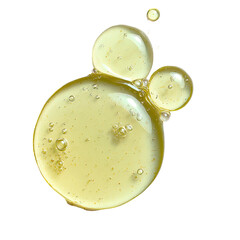Close-up of light yellow liquid droplets