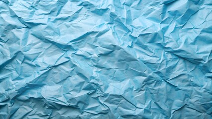 Close up abstract texture of crumpled light blue paper