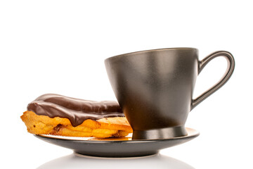 Chocolate sweet eclair, macro, isolated on white background.