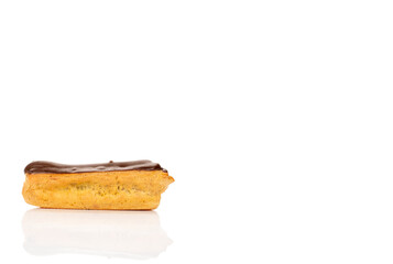 Chocolate sweet eclair, macro, isolated on white background.