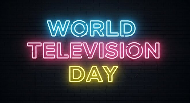 Celebrate World Television Day with vibrant neon lights creating a festive, modern atmosphere on a brick wall.