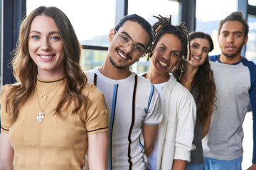 Stylish young coworkers enjoying collaboration in a modern office environment during the day