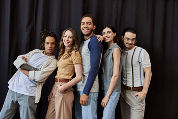 Stylish young friends showcase their unique fashion sense in an urban setting