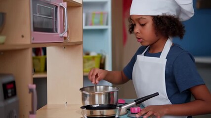 Young aspiring chef stirring ingredients in a playful kitchen setting scene