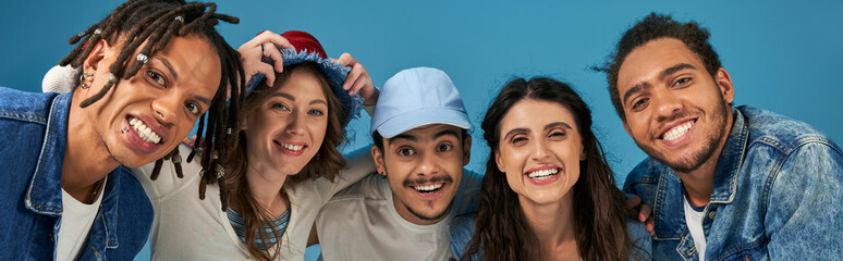 Stylish young friends enjoying each others company in a fun and colorful setting