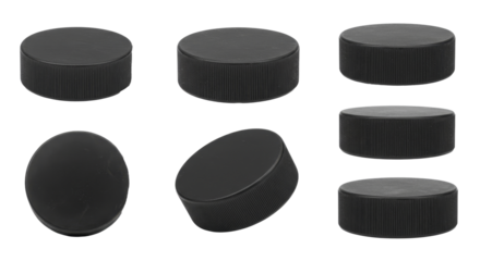 Black Sport Pucks Isolated on White Background in Various Angles
