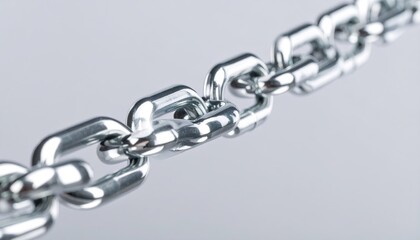 Fototapeta premium Silver Metal Chain Links on Neutral Background