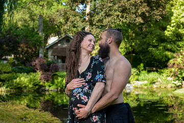 Photography of a lovely young couple expected a baby