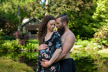 Photography of a lovely young couple expected a baby