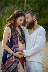 Photography of a lovely young couple expected a baby