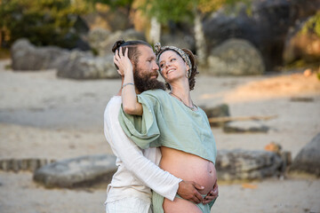 Photography of a lovely young couple expected a baby