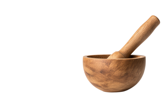 Wooden mortar and pestle on a white isolated background.