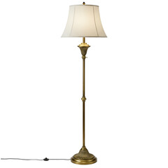 Obraz premium A classic brass floor lamp featuring a white fabric lampshade, perfect for adding an elegant touch to any interior space or home decor project.