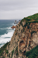 Dramatic coastal cliffs with waves in Portugal