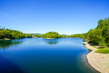 View of the Aggertalsperre Dam in the Oberbergisches Land region of North Rhine-Westphalia. A...