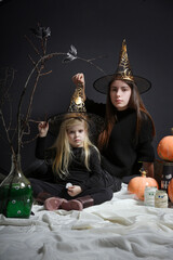 Two girls funny studio Halloween photoshoot