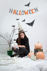 Teenage girl studio Halloween photoshoot 