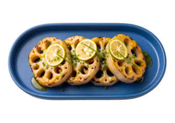 Golden-brown lotus root slices, glazed with a savory sauce, are garnished with lime wedges and spring onions on a rich blue platter.