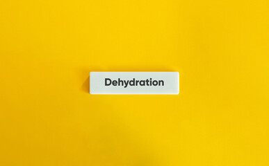 Dehydration Text on White Tile with Yellow Background