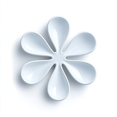 A minimalist, light-blue ceramic dish shaped like a stylized flower with seven petals, cast shadow visible
