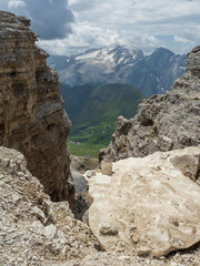 A High Mountain Pass Overlooking A Valley In The Dolomites, Italy