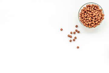 cereals, oatflakes and cornflakes for healthy breakfast on white background top view mock up