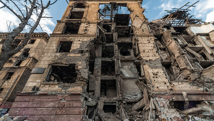 ruined street and destroyed houses the city Kiev war in Ukraine